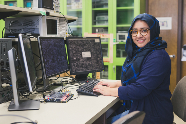 Engineering student sitting at computers.