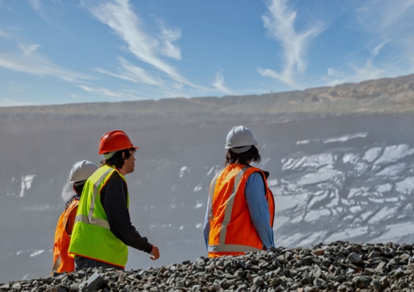 Group of engineers walking in the mountains.